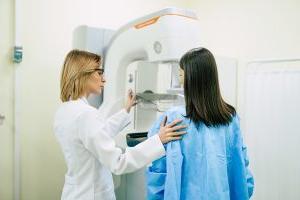 Woman receiving a mammogram